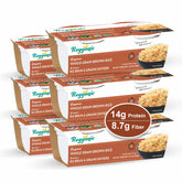 Six microwaveable cups of Regganic organic whole grain brown rice in 8.8 oz packaging by Regal Kitchen Foods USA LLC
